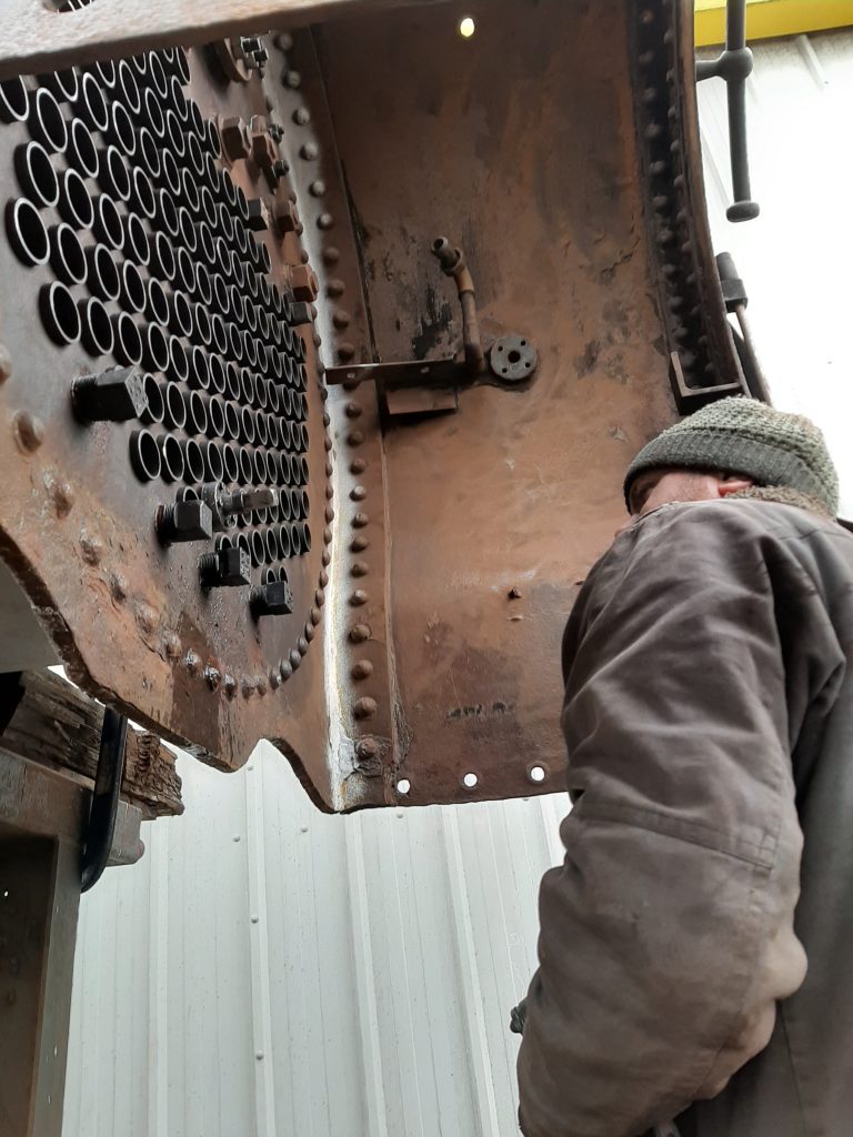 Matt Jervis inspects FR 20's front tubeplate for leaks