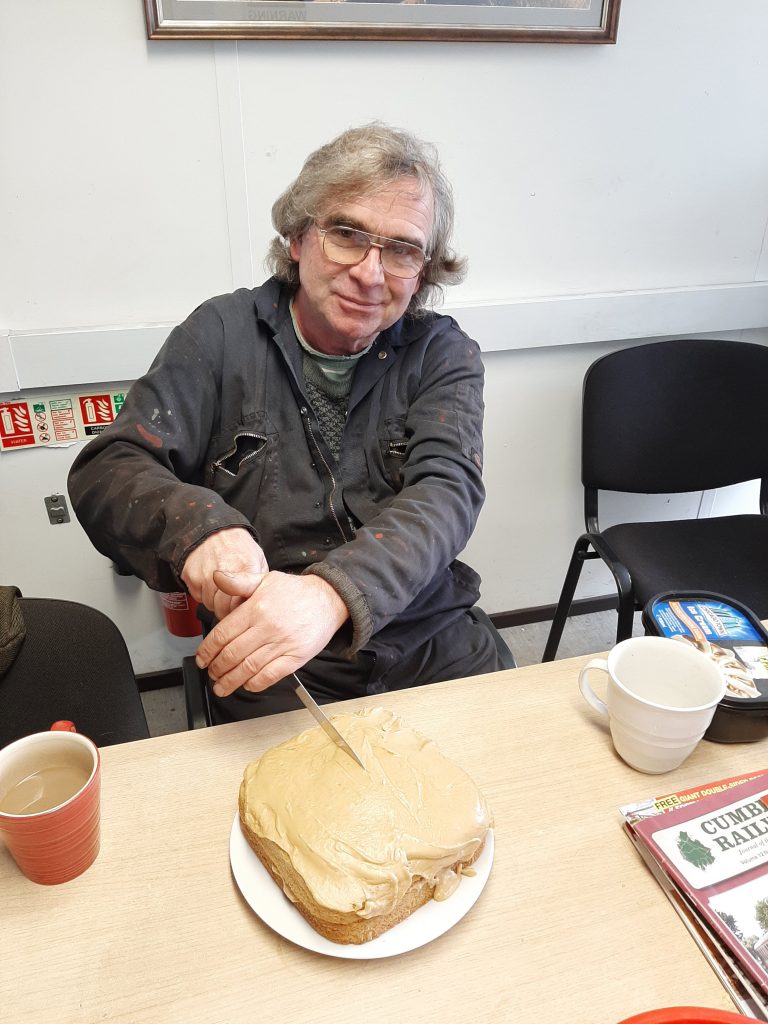 Ade with his cake