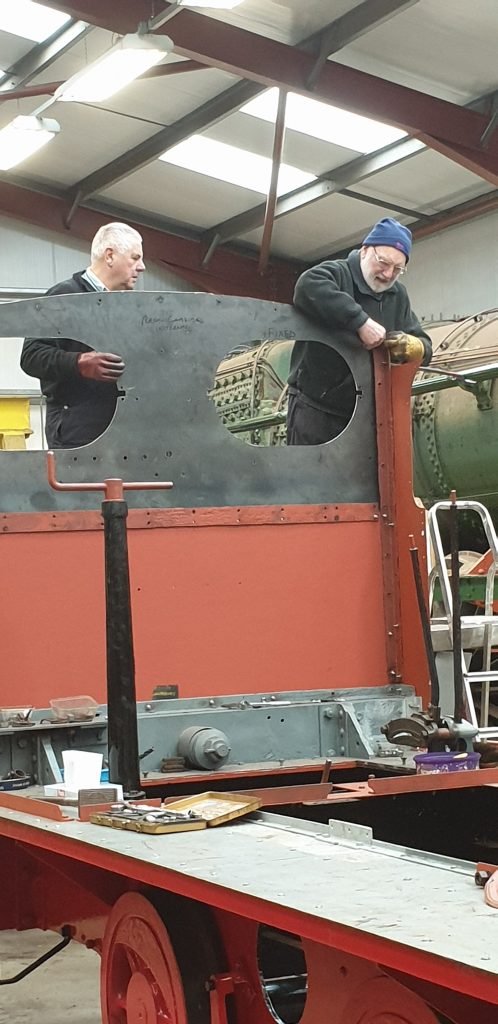 John Davis and Phil building Fluff's cab