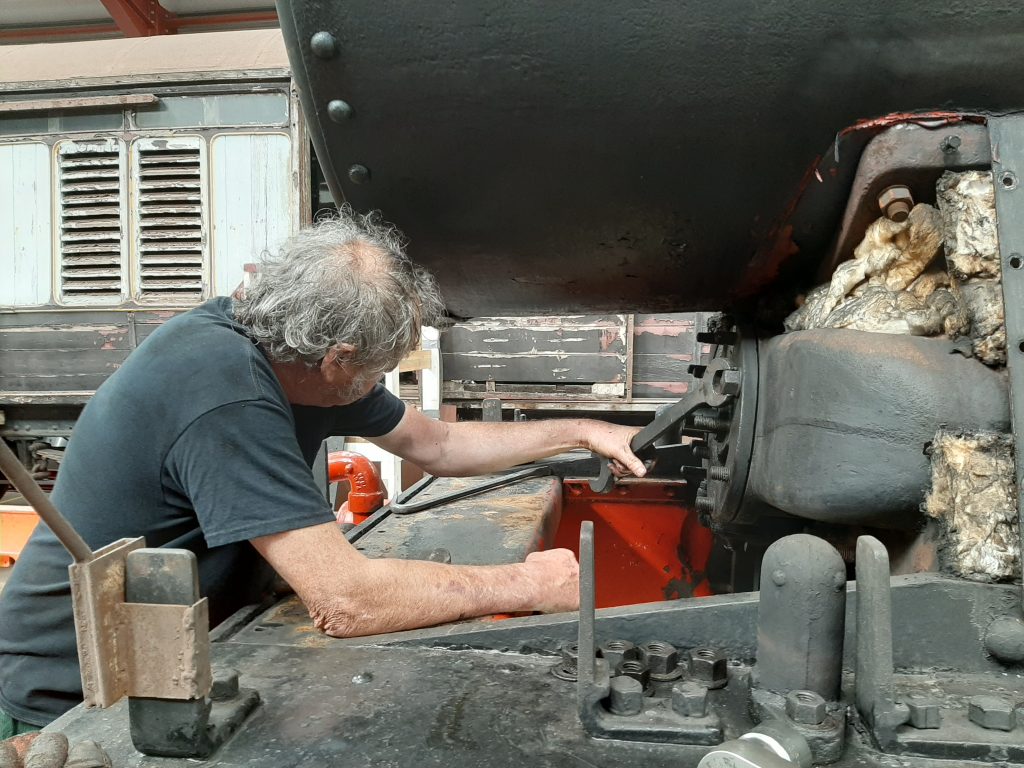 Keith removes a valve cover on 5643