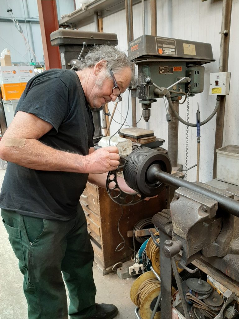 Keith measures one of 5643's valves