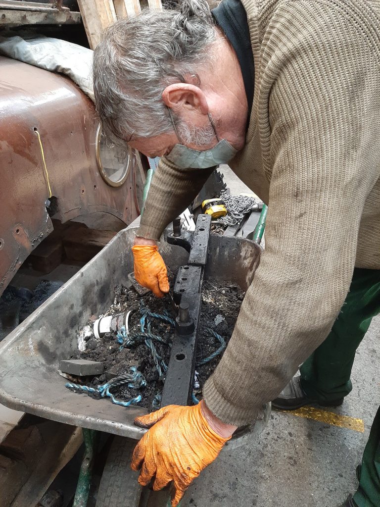 Keith cleaning the firehole door support for 5643