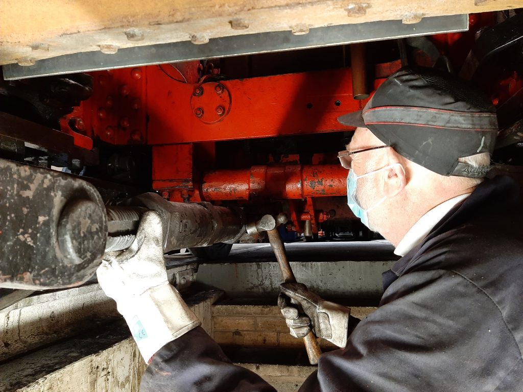 Phil inspects the brake turnbuckle on 5643