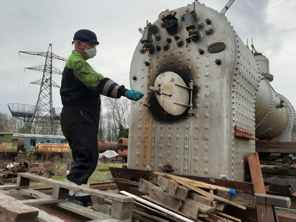 Alan Bennett inspects the firebox on FR 20's boiler