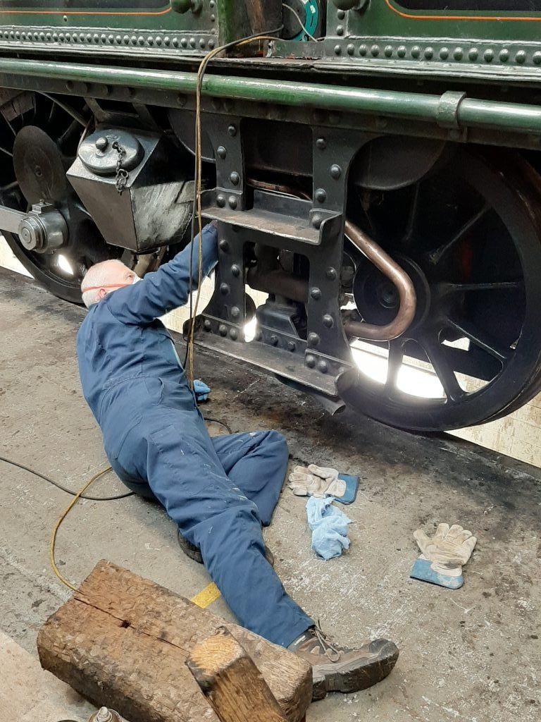 Paul Newton cleans some of 5643's copper pipework