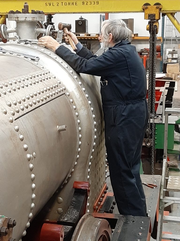 Alan Middleton removing blanks from the boiler