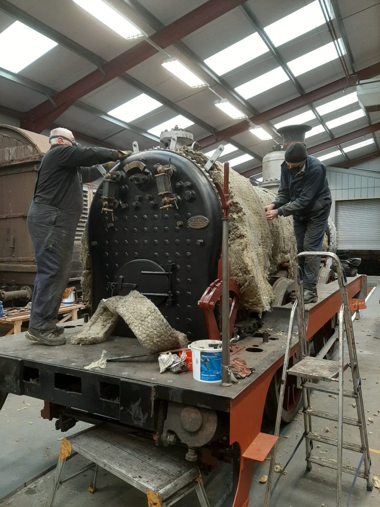 John Davis and Neil Smith fit the insulation to FR 20's boiler