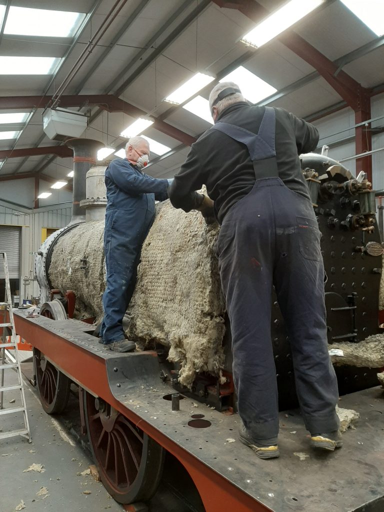 Paul newton and John Davis fitting the insulation to FR 20's boiler