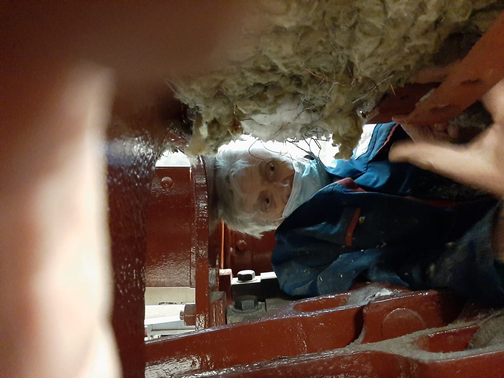 Ed Tatham working to fasten crinolines in the confined space under FR 20's boiler