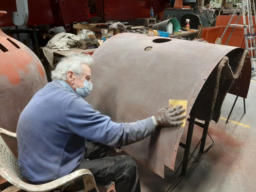 Fred sanding another cladding sheet