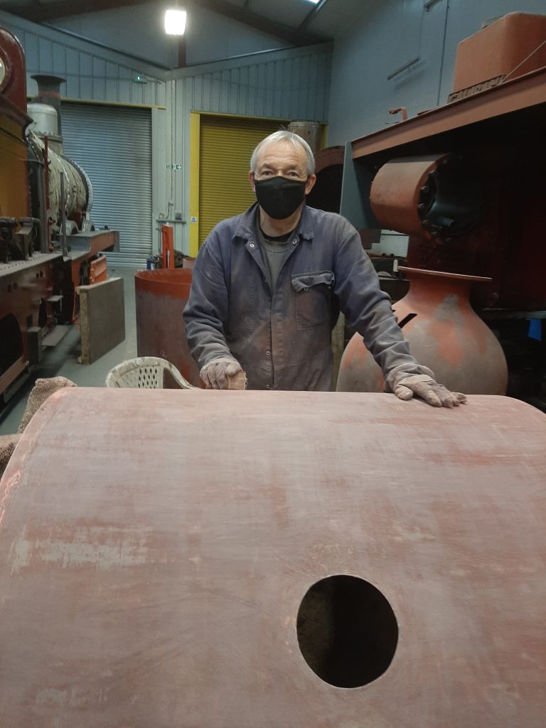 Tim Owen at work on FR 20's boiler cladding