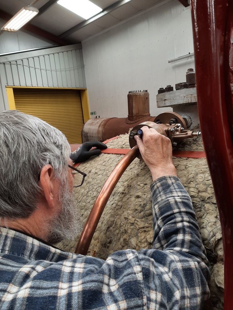 Alan marking one of the flanges for soldering to the injector steam pipe