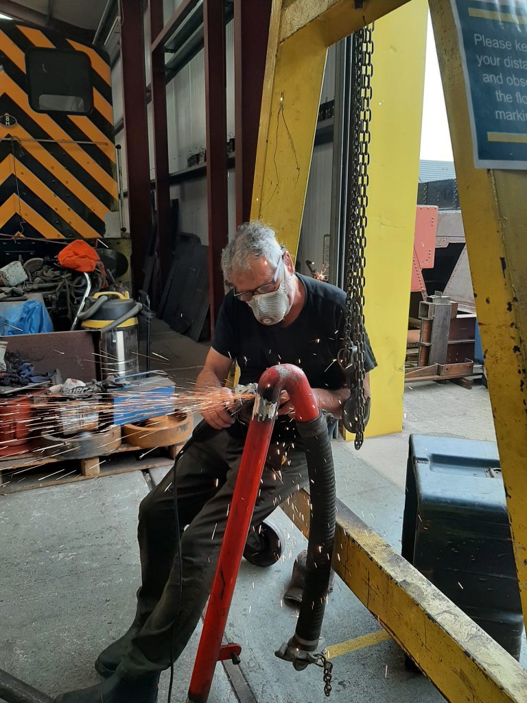 Keith grinding Wootton Hall's repaired tender pipework