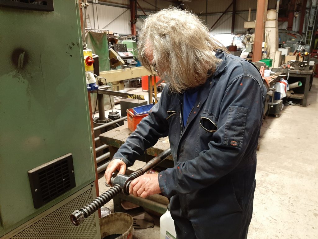 Ade testing the Cumbria's handbrake nut on the shaft