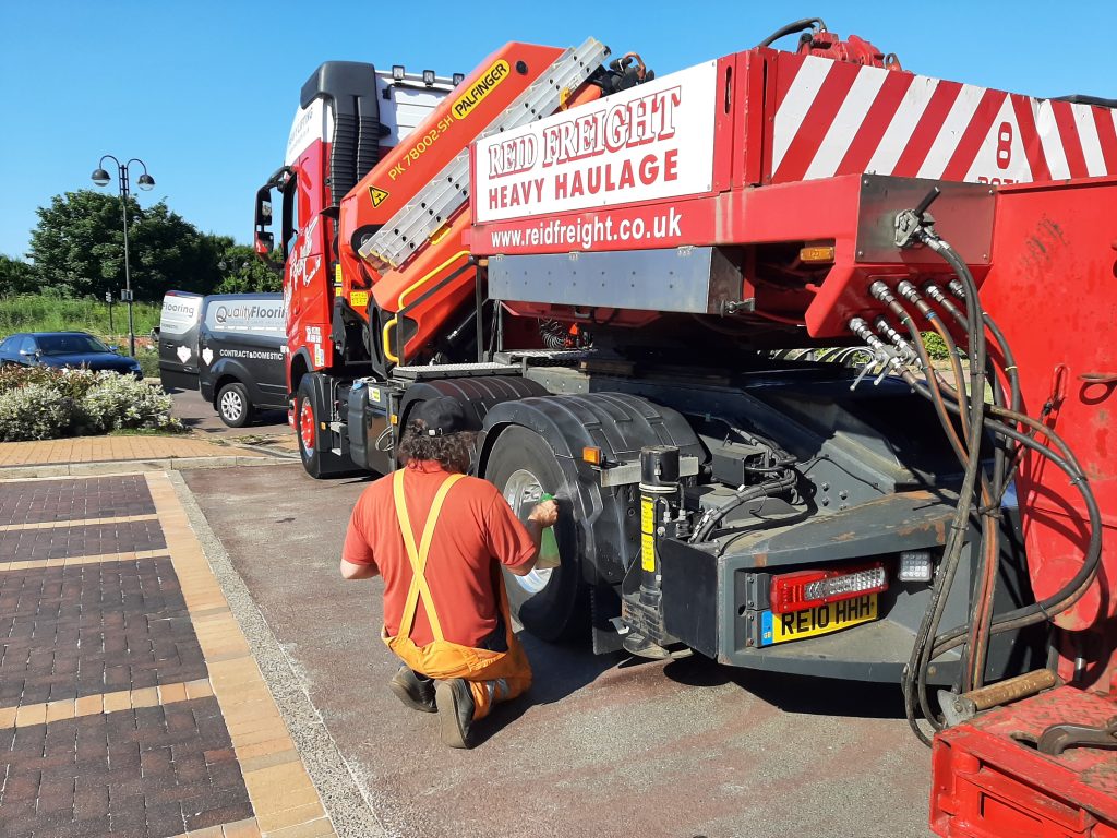 Simon Reid gives his lorry a polish