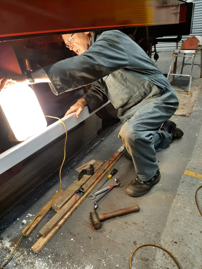 John Dixon working under FR 20's R/H valance.