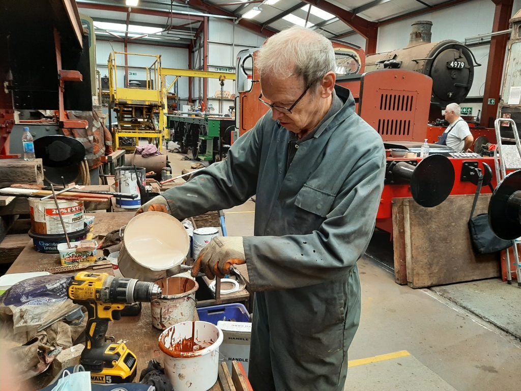 John Dixon preparing the 2 pack paint