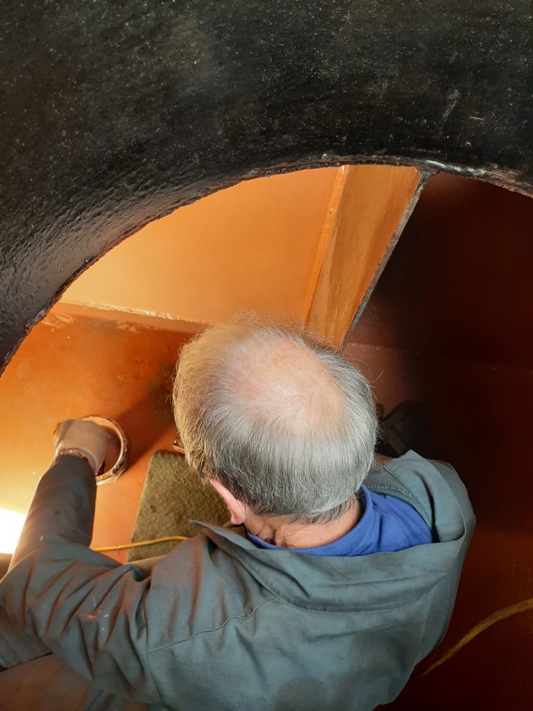 John Dixon busy in the tender tank