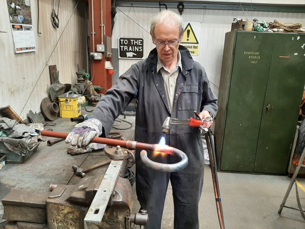 John Dixon fabricating a new blower ring for FR 20