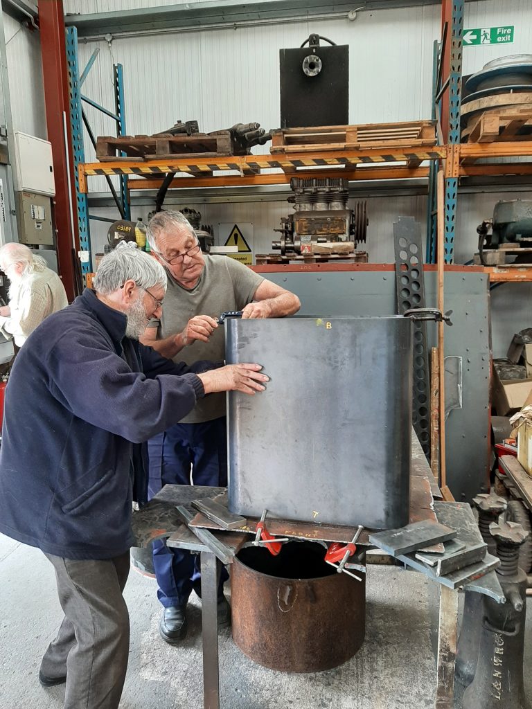 Alan and Keith putting together new steelwork for the new water take off box for Wootton Hall's tender