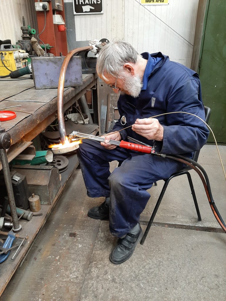 Alan repairing a joint on FR 20's right hand injector steam pipe