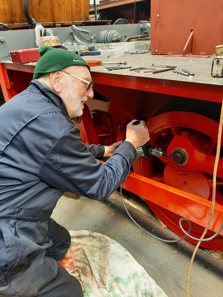 Phil Bell reaming out a hole for the taper pin to hold Fluff's right hand coupling rod in place