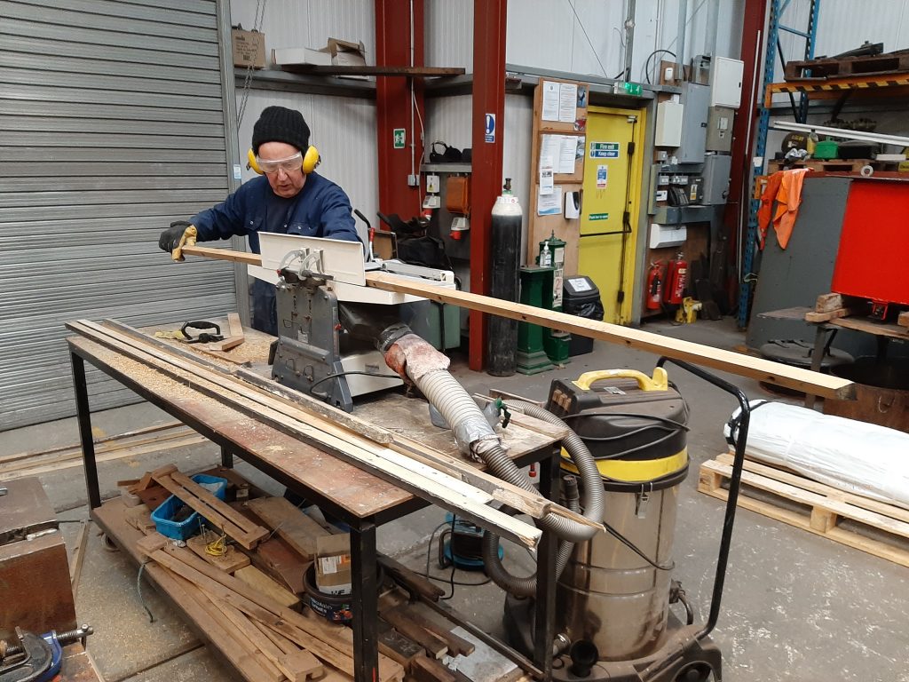 Phil Burton sets up his planer