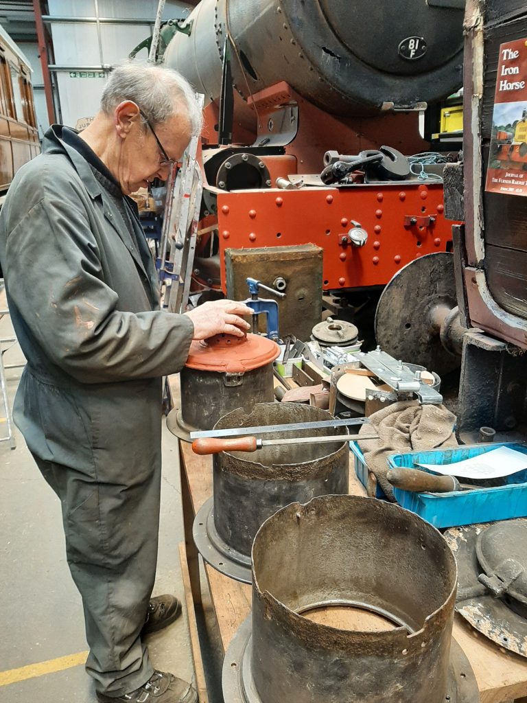 John Dixon with upper and lower sections of one of GER 5's gas lamp housings
