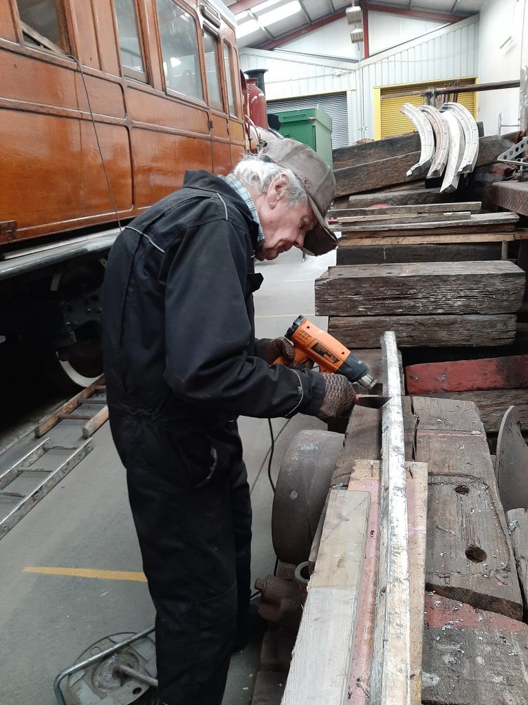 Fred removing paint from one of the rain strips