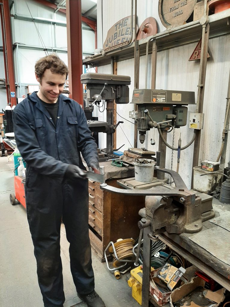 Sam applying emery paper to Caliban's regulator handle