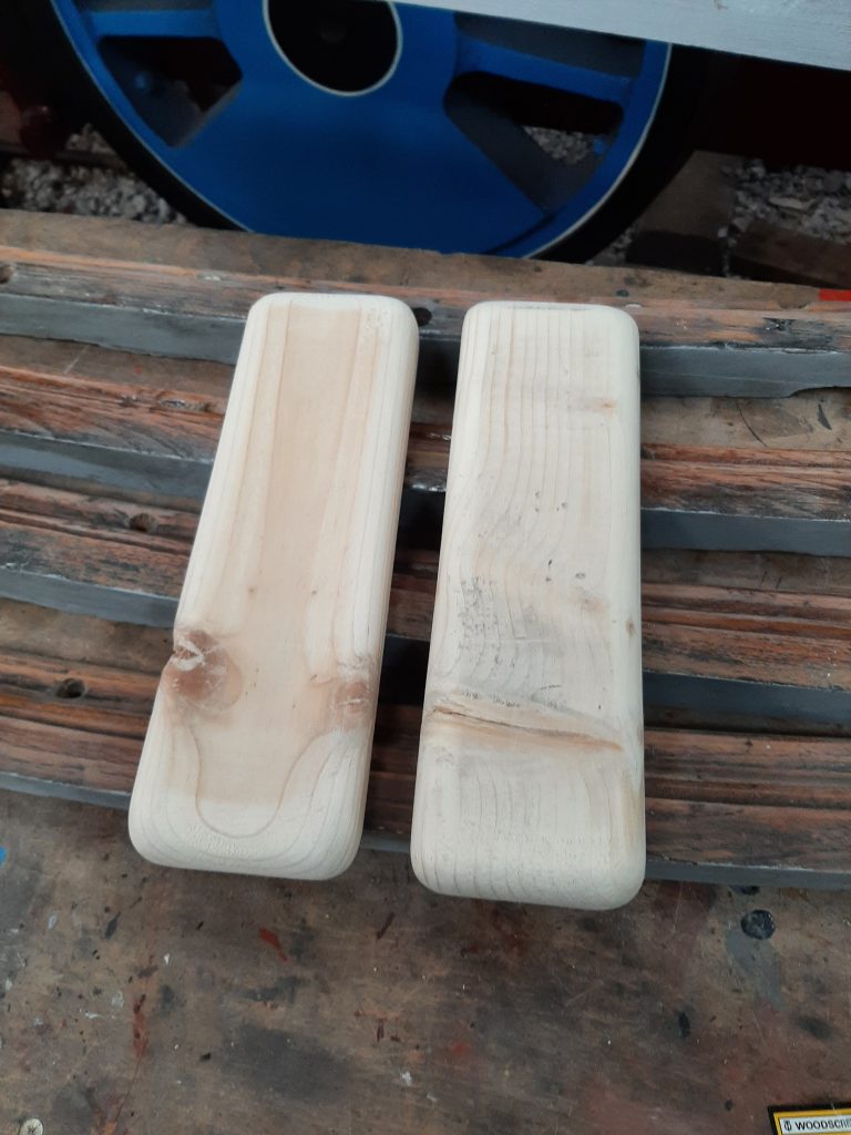 Two of the new wooden tamping blocks ready for action