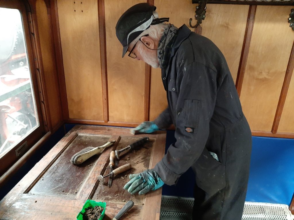 Roger removing varnish from a door on GER 5