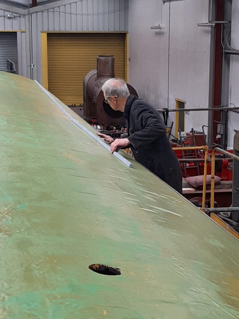 John Dixon fitting the rain strips on GER No. 5