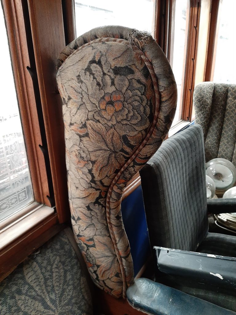The end of the chaise longue that has been removed for reupholstering
