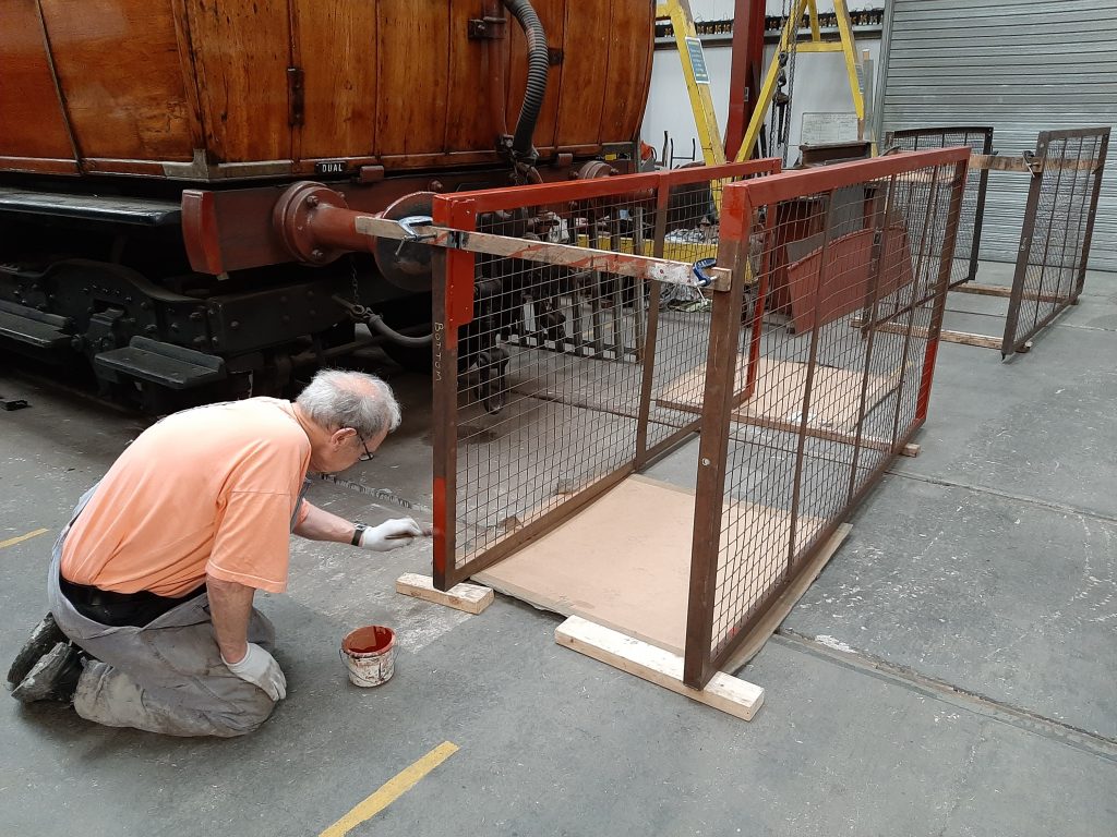 John Dixon painting the new gas bottle cage