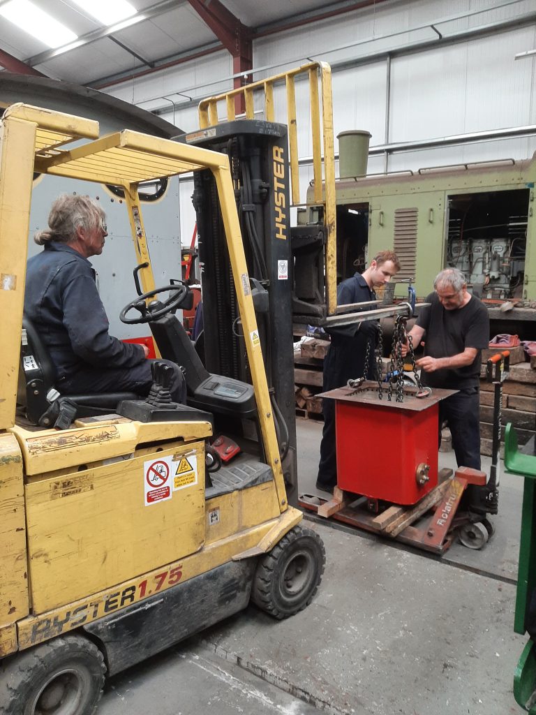 Preparing to lift the water take off sump for Wootton Hall's tendertank