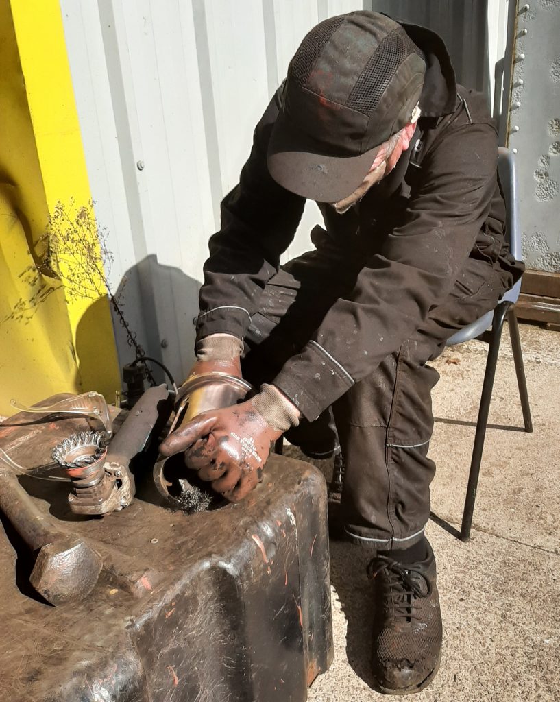 Fred cleaning a brake shaft trunnion for Wootton Hall