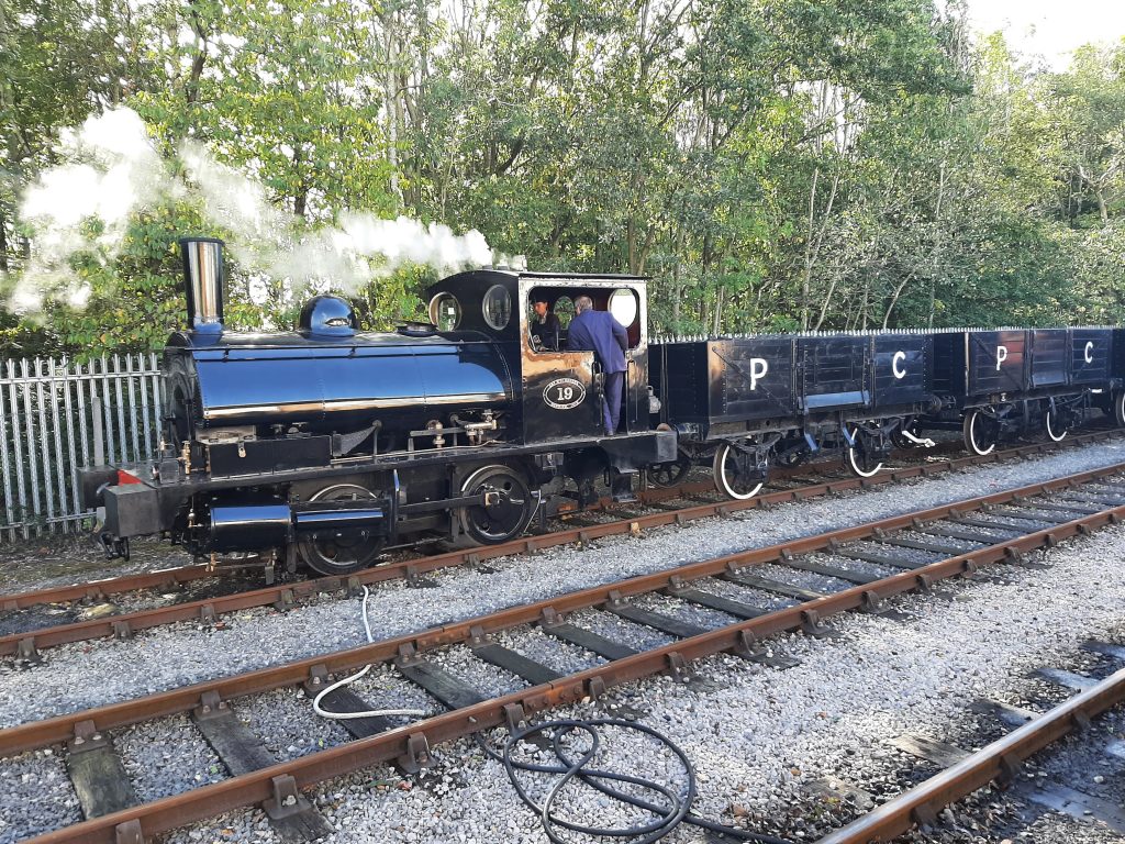 The Pug with the former Preston Corporation wagons