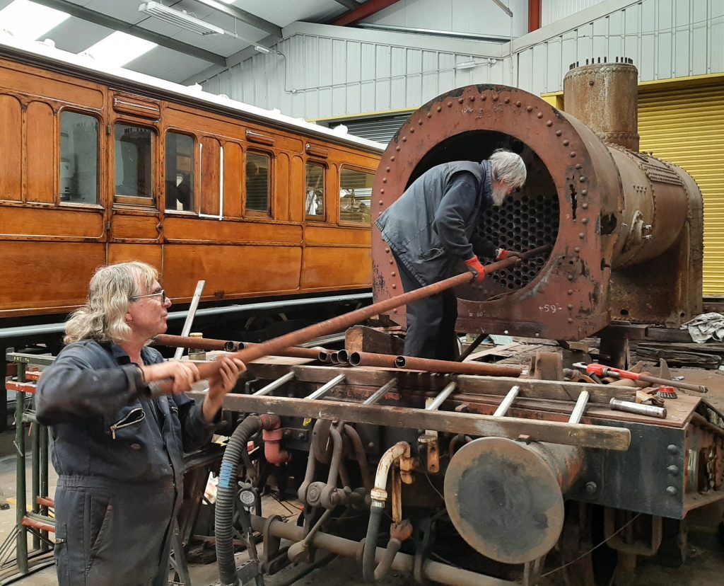 Ade and Alan haul out one of Caliban's tubes