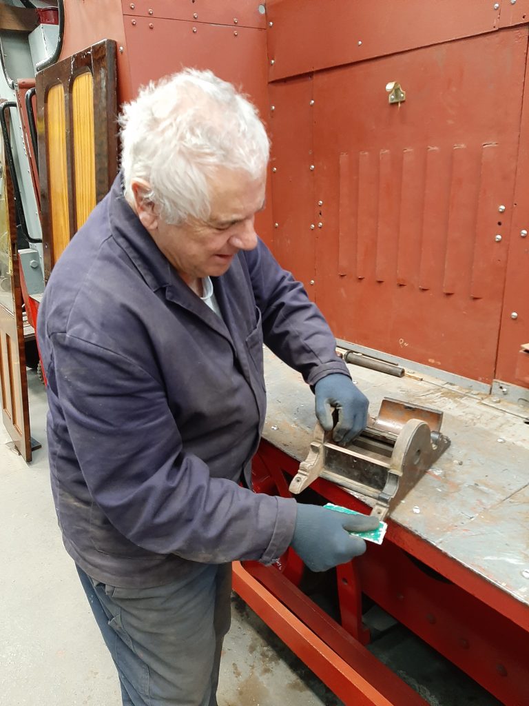 John Davis sprucing up the royal toiler roll holder from GER 5