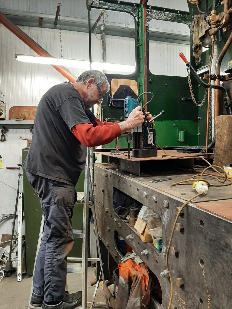 Keith working to construct a new cab floor for Wootton Hall