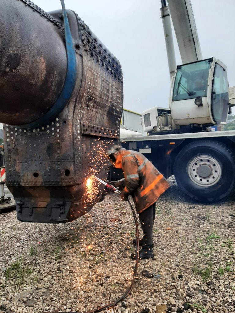 Keith burning off the ashpan retaining bolts