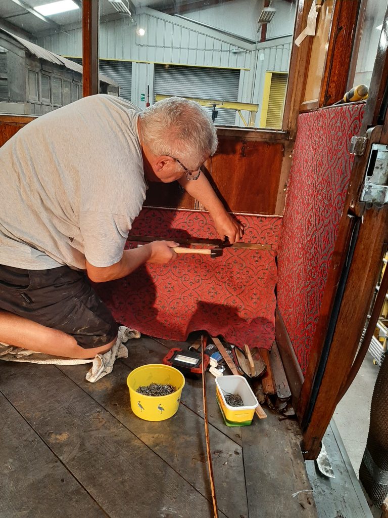 John Davis fitting chenille at the east end of the east saloon of GER No. 5