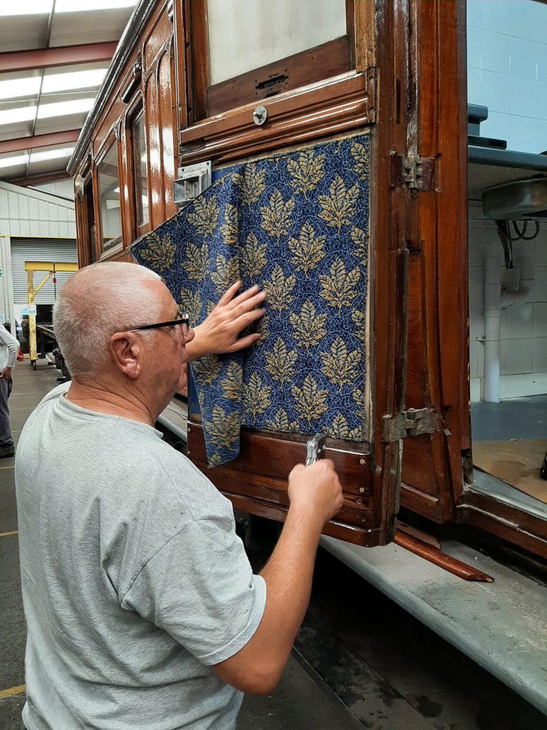 John Davis upholstering the last door on GER No 5