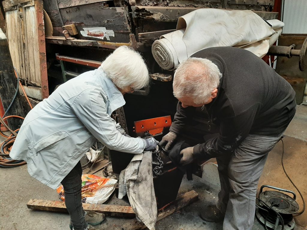 Anne Burton and John Davis working together on one of 5643's sandboxes