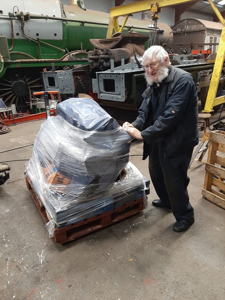 Alan Middleton with the gift wrapped replacement engine for Fluff