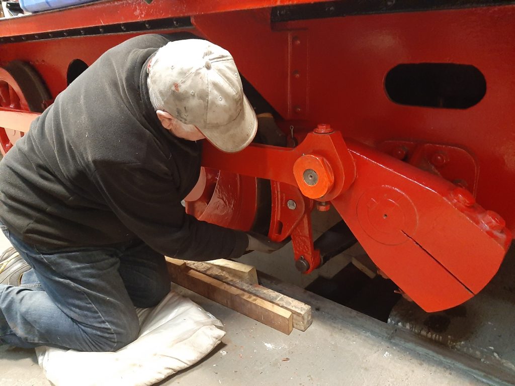 John Davis refitting Fluff's brake blocks