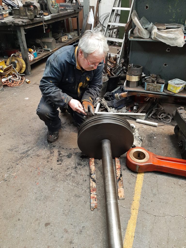Paul Balshaw cleaning up one of 5643's pistons