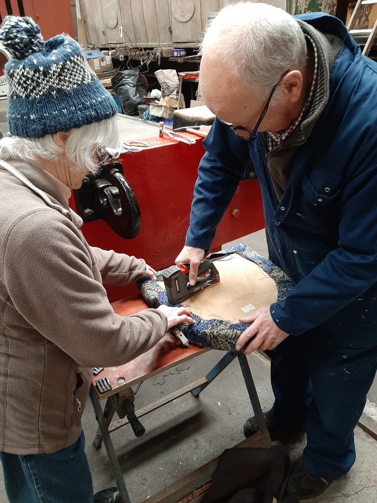 Anne and Phil Burton re-covering seats for GER 5 with horse chestnut leaf moquette