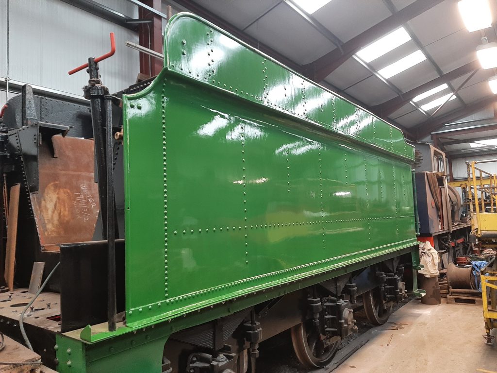 Second coat of undercoat green drying in the shed